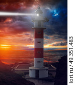 Lighthouse Punta de Teno is Tenerife on the Atlantic Ocean. Lighthouse Punta de Teno . Стоковое фото, агентство Ingram Publishing / Фотобанк Лори