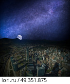 Panoramic view of Santiago de Chile and Los Andes mountain range. night, the starry sky and the moon shine.. Panoramic view of Santiago de Chile. Стоковое фото, агентство Ingram Publishing / Фотобанк Лори