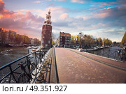 Amsterdam is the capital and largest city of the Netherlands.. Amsterdam autumn. Стоковое фото, агентство Ingram Publishing / Фотобанк Лори