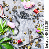 Fashionable female bijouterie. Stylish female retro jewelry made of chains, beads and pendants.Design and bijouterie. Стоковое фото, агентство Ingram Publishing / Фотобанк Лори