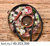 Oriental tobacco hookah with floral jasmine aroma. Smoke hookah with jasmine floral scent.Shisha concept.Modern hookah. Стоковое фото, агентство Ingram Publishing / Фотобанк Лори