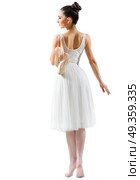 Young ballerina isolated on white. Young ballerina isolated. Стоковое фото, агентство Ingram Publishing / Фотобанк Лори