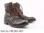 Brown boots on the white background, isolated. Boots. Стоковое фото, агентство Ingram Publishing / Фотобанк Лори