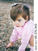 Little girl playing at the park . Стоковое фото, агентство Ingram Publishing / Фотобанк Лори