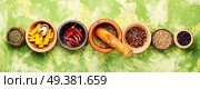 Big set Indian spices and herbs.Food and cuisine ingredients.Spices concept. Different spices in bowls on table. Стоковое фото, агентство Ingram Publishing / Фотобанк Лори