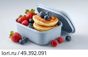 Delicious mini pancakes surrounded by fresh fruit at breakfast time. Вкусные мини-блинчики в окружении свежих фруктов во время завтрака. Стоковое AI-изображение, AI-художник Katsiaryna Repich / Фотобанк Лори