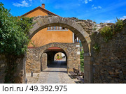 Potes village arch arcades in Cantabria of Spain. Стоковое фото, агентство Ingram Publishing / Фотобанк Лори