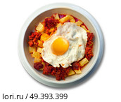 Cazuela abuela potatoes chorizo sausage and egg recipe from Asturias. Стоковое фото, агентство Ingram Publishing / Фотобанк Лори