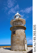 Islas Cies islands lighthouse Faro Cies in Vigo of Galicia. Стоковое фото, агентство Ingram Publishing / Фотобанк Лори