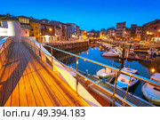 Llanes marina port sunset in Asturias of Spain. Стоковое фото, агентство Ingram Publishing / Фотобанк Лори