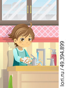 A vector illustration of a boy washing his hands. Стоковая иллюстрация, агентство Ingram Publishing / Фотобанк Лори