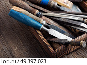 Set old wood chisels selection.Retro tools.Tool carpenter. Carpentry hand tools set. Стоковое фото, агентство Ingram Publishing / Фотобанк Лори