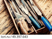 Set old wood chisels selection.Retro tools.Tool carpenter. Retro carpenter tool. Стоковое фото, агентство Ingram Publishing / Фотобанк Лори