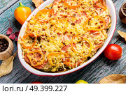 Stewed, baked zucchini, tomatoes and peppers.Vegetable casserole.Traditional French food. Diet vegetarian vegan food. Стоковое фото, агентство Ingram Publishing / Фотобанк Лори