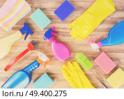 Spring cleaning concept - colorful sprays bottles and rubbers pattern, retro toned. Spring cleaning concept. Стоковое фото, агентство Ingram Publishing / Фотобанк Лори