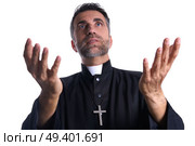 Priest open hands arms praying offering oblation. Стоковое фото, агентство Ingram Publishing / Фотобанк Лори