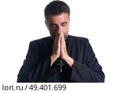 Praying hands priest portrait of male pastor. Стоковое фото, агентство Ingram Publishing / Фотобанк Лори