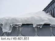 Iced roof closeup detail background in Andorra. Стоковое фото, агентство Ingram Publishing / Фотобанк Лори
