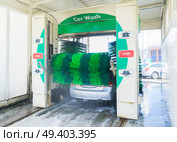 Washing one gray car with water on station. Washing gray car. Стоковое фото, агентство Ingram Publishing / Фотобанк Лори