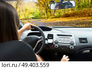 car windscreen with country autumn road, view inside out. car windscreen with road. Стоковое фото, агентство Ingram Publishing / Фотобанк Лори