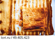 tomato ratatouille pie with puff pastry on a oven paper. Стоковое фото, агентство Ingram Publishing / Фотобанк Лори