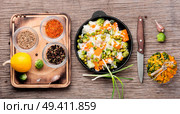 Vegetable rice risotto with pumpkin, carrots, peas and cabbage. Autumn menu. Autumn food. Lean vegetable risotto. Стоковое фото, агентство Ingram Publishing / Фотобанк Лори