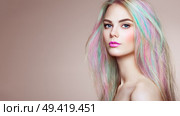 Beauty Fashion Model Girl with Colorful Dyed Hair. Girl with perfect Makeup and Hairstyle. Model with perfect Healthy Dyed Hair. Rainbow Hairstyles. Стоковое фото, агентство Ingram Publishing / Фотобанк Лори