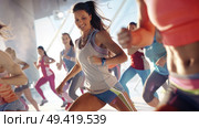 A group of women elegantly dancing in a studio filled with mirrors and ballet bars, showcasing their grace and skill in synchronized movements. Стоковое AI-изображение, AI-художник Данила Большаков / Фотобанк Лори