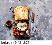 Meat Wellington - a festive dish of meat. Homemade roasted meat loafs. Стоковое фото, агентство Ingram Publishing / Фотобанк Лори