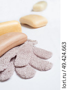 high-grade natural aroma soaps with washing mitten at wite background. Стоковое фото, агентство Ingram Publishing / Фотобанк Лори