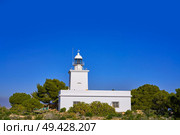 Faro de Santa Pola lighthouse in Alicante at Costa blanca of Spain. Стоковое фото, агентство Ingram Publishing / Фотобанк Лори