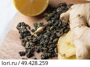 set  with high quality jasmine green tea and ginger. close up. Стоковое фото, агентство Ingram Publishing / Фотобанк Лори