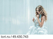 Portrait of a blond, young beautiful woman. Стоковое фото, агентство Ingram Publishing / Фотобанк Лори