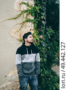 Young man in calm outdoors. Стоковое фото, агентство Ingram Publishing / Фотобанк Лори