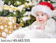 Closeup portrait of a little santa boy. Стоковое фото, агентство Ingram Publishing / Фотобанк Лори