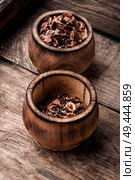Rhubarb seeds on a wooden table.Seed preparation for sowing. Rhubarb seeds in bowl. Стоковое фото, агентство Ingram Publishing / Фотобанк Лори