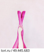 Female legs wearing pink tights                                . Стоковое фото, агентство Ingram Publishing / Фотобанк Лори