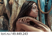 Pretty brunette lady taking a sunbath. Стоковое фото, агентство Ingram Publishing / Фотобанк Лори