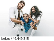 Conceptual portrait of funny doctors and patient in the madhouse. Стоковое фото, агентство Ingram Publishing / Фотобанк Лори
