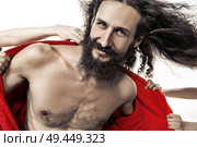 Skinny, handsome casanova among many women. Стоковое фото, агентство Ingram Publishing / Фотобанк Лори