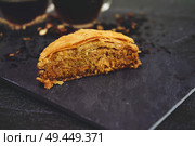  Turkish baklava with organic black tea                              . Стоковое фото, агентство Ingram Publishing / Фотобанк Лори
