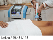 Woman getting cosmetic procedures at beauty center. Стоковое фото, агентство Ingram Publishing / Фотобанк Лори