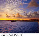 Cambrils beach sunset in Tarragona at Costa Daurada of Catalonia. Стоковое фото, агентство Ingram Publishing / Фотобанк Лори