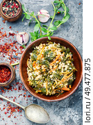 Popular food of the Middle East.Stew bulgur.Bulgur with portulak.. Stewed bulgur with portulak. Стоковое фото, агентство Ingram Publishing / Фотобанк Лори
