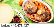 Ossobuco, traditional dish of Italian cuisine. Stewed calf leg. Italian veal steak ossobuco. Стоковое фото, агентство Ingram Publishing / Фотобанк Лори