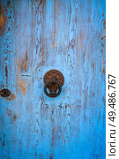 Ibiza Eivissa downtown Dalt Vila blue door in Balearic Islands. Стоковое фото, агентство Ingram Publishing / Фотобанк Лори