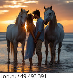 A couple is kissing in front of two horses on a beach. Стоковое AI-изображение, AI-художник Ярославский Максим / Фотобанк Лори