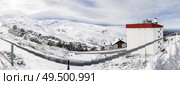Spain, Andalusia, Granada. Panoramic view of ski resort of Sierra Nevada in winter, full of snow. Travel and sports concepts.. Ski resort of Sierra Nevada in winter, full of snow. Стоковое фото, агентство Ingram Publishing / Фотобанк Лори