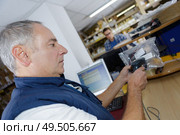 worker at a diy renovations off the rack. Стоковое фото, агентство Ingram Publishing / Фотобанк Лори
