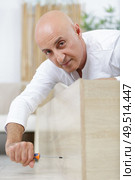 fa urniture assembly at home. Стоковое фото, агентство Ingram Publishing / Фотобанк Лори